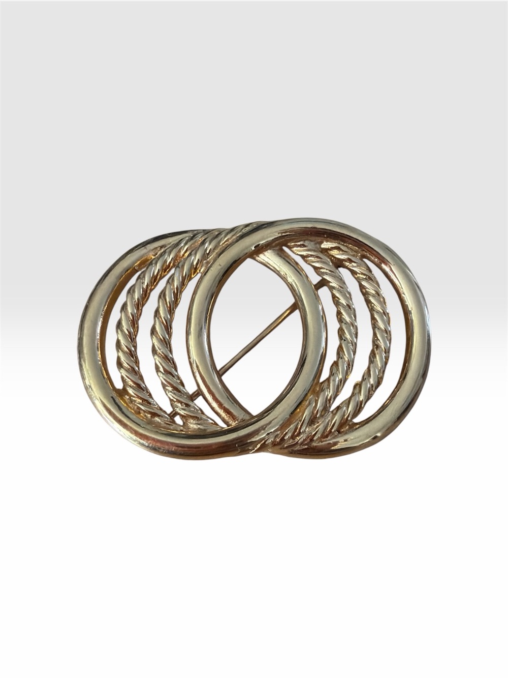 Monet Gold-Tone Triple Circle Brooch